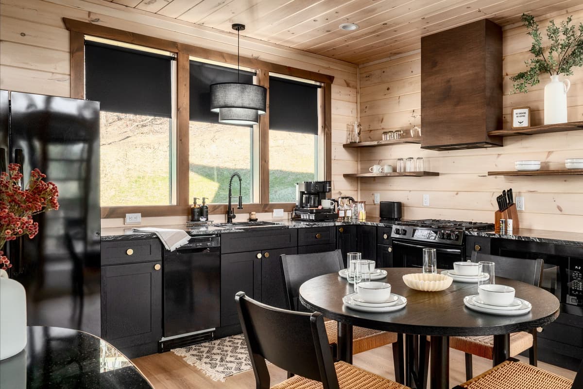 Just off the living room, the charming four-seat dining area offers a comfortable place to sit down and enjoy meals together.