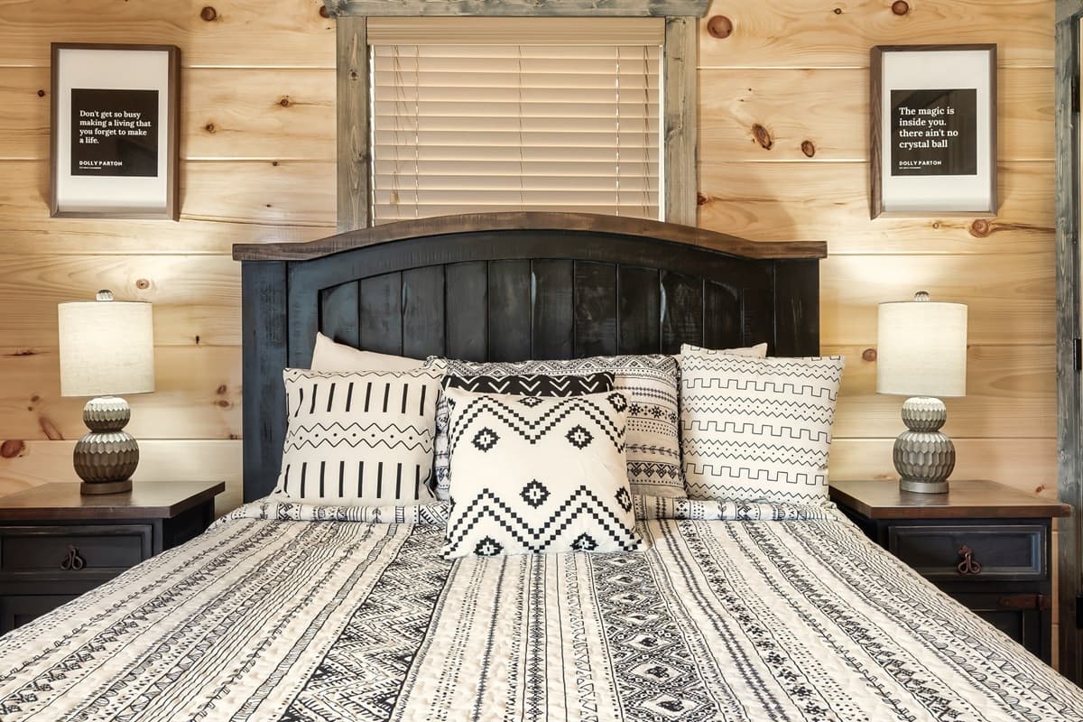 Escape to this spacious bedroom configured with a queen bed in the main level.