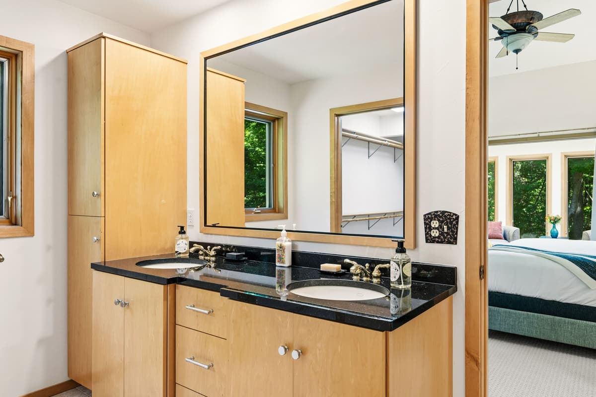 The bathroom features a comfortable and functional layout for your daily routine.