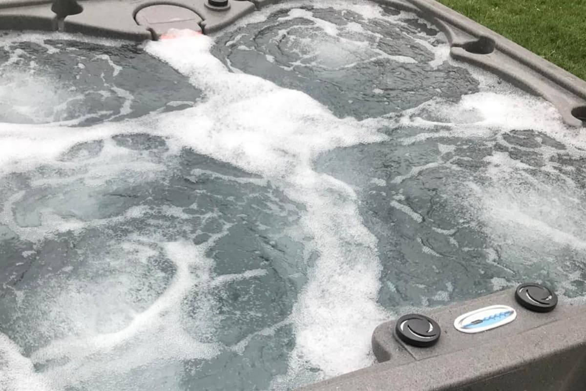 Relax and unwind in the inviting hot tub, perfect for soothing your muscles after a day of adventure.