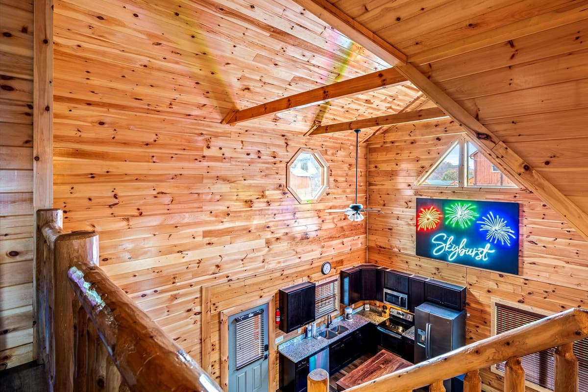 Natural wood details create a warm and inviting atmosphere throughout the space. Rustic accents add a touch of authentic Smoky Mountain charm to your stay.