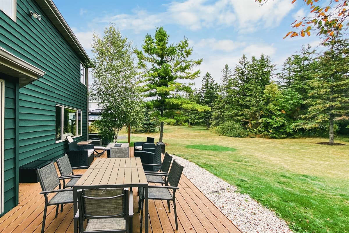 The deck is equipped with comfortable seating, perfect for unwinding after a day of exploration.