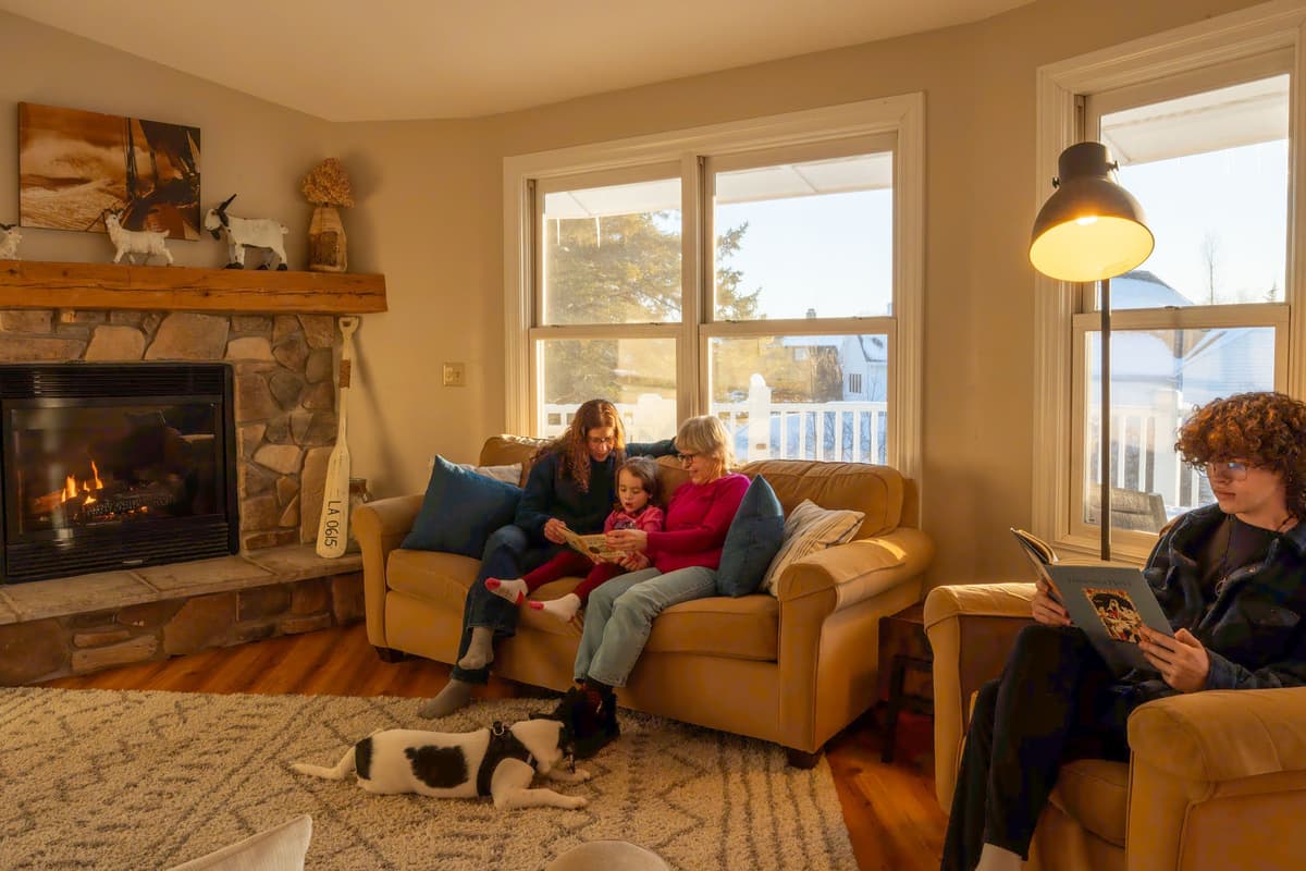 A comfortable seating area, TV, and fireplace create the perfect setting for relaxing evenings.