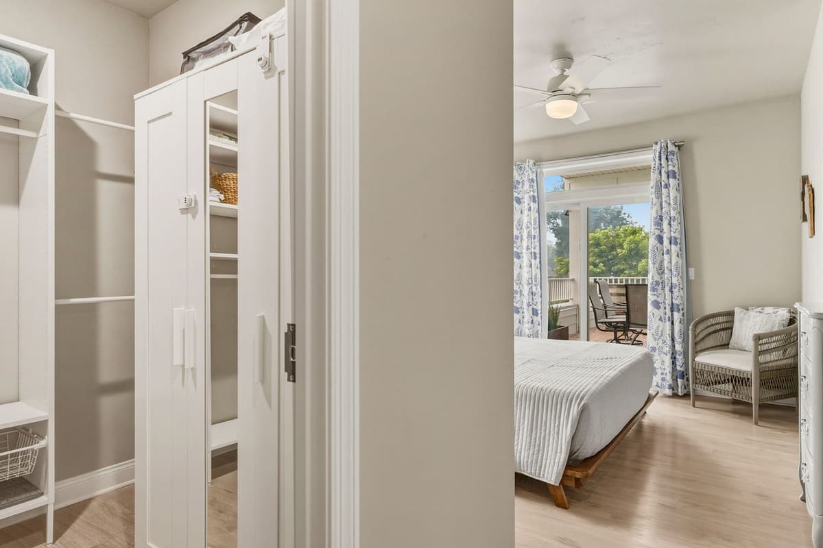 Settle into this spacious and inviting king bedroom, designed with comfort and relaxation in mind.
