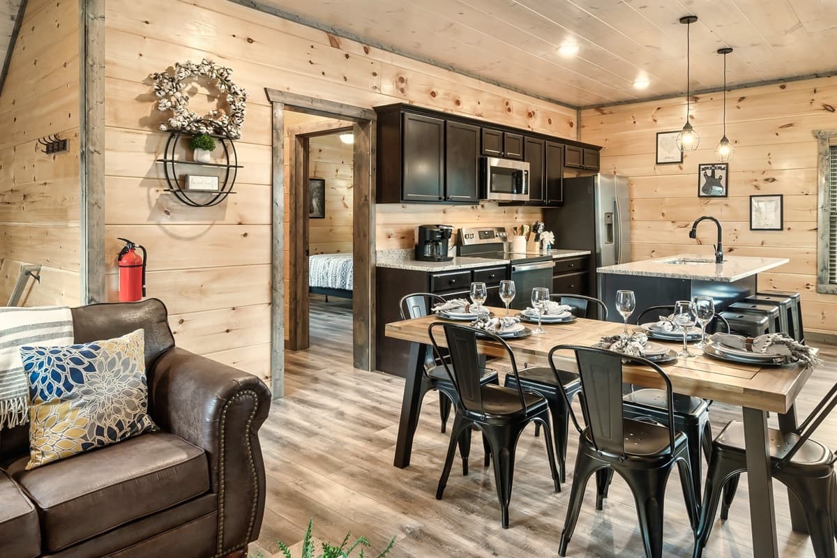 The best part about this home? The open concept living room, dining room and kitchen.aits you in this cabin with open concept living and kitchen space.