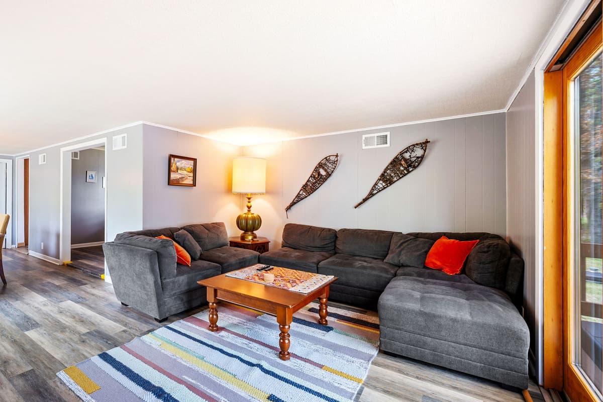 The cozy sofa provides plenty of space to sit back and enjoy your favorite shows or movies on the TV
