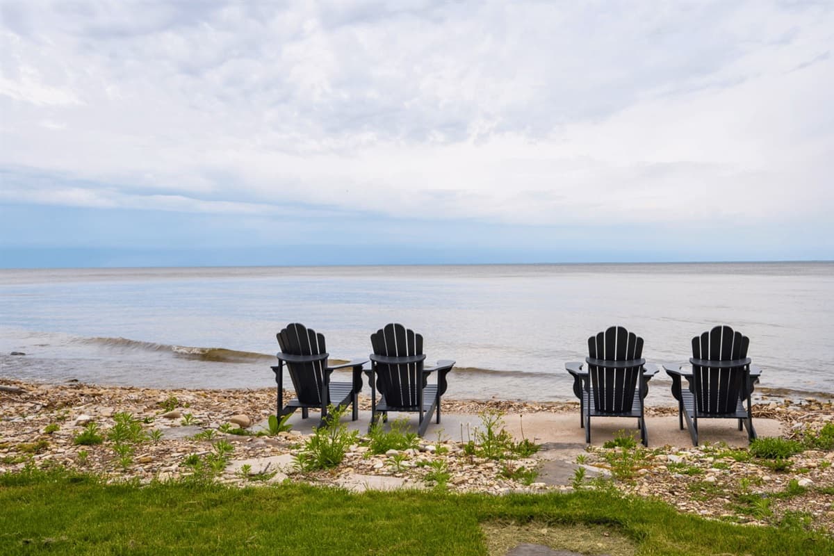 Imagine sitting in a cozy chair, nestled by the tranquil waters of the lake, the gentle breeze whispering through the trees, and the mesmerizing beauty of nature unfolding before your eyes.