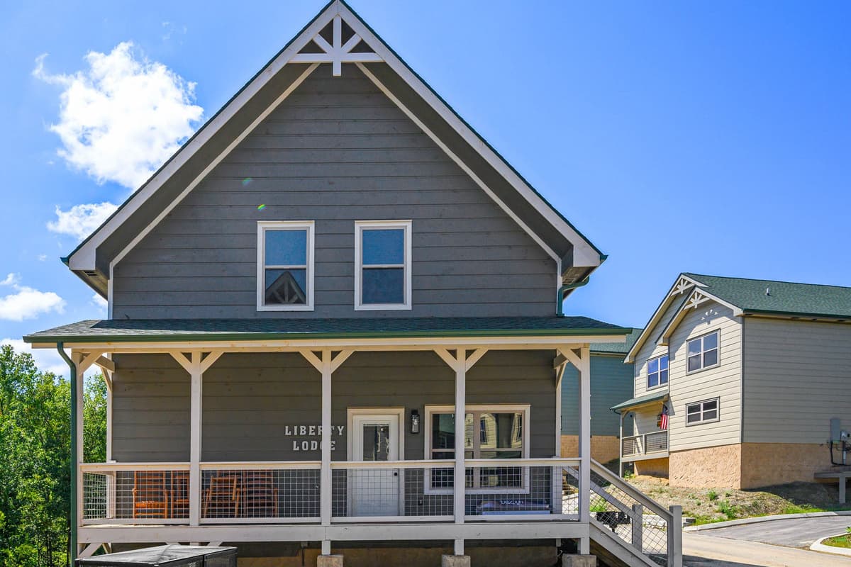 Step outside and enjoy the peaceful charm of the cabin porch.