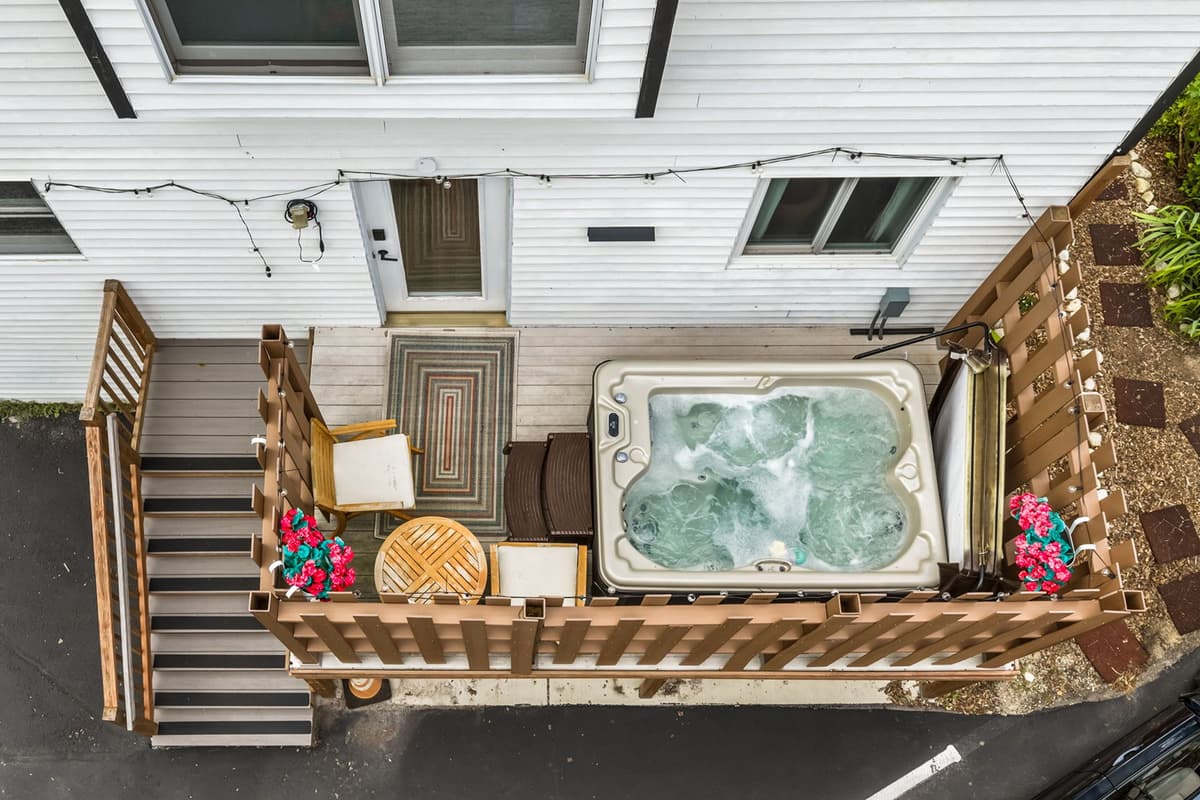 The deck also provides easy access to the hot tub for an added touch of relaxation.