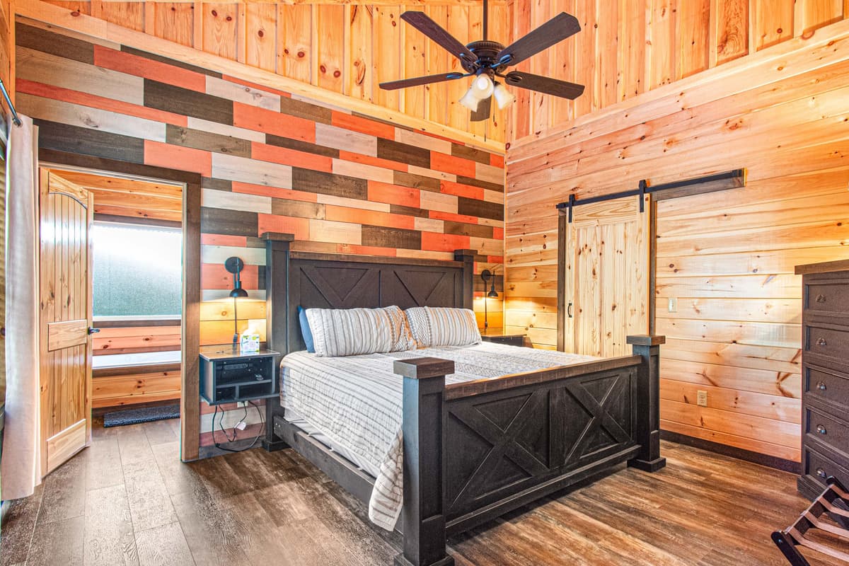 Enjoy a restful escape in this inviting king bedroom, thoughtfully furnished for comfort and relaxation.