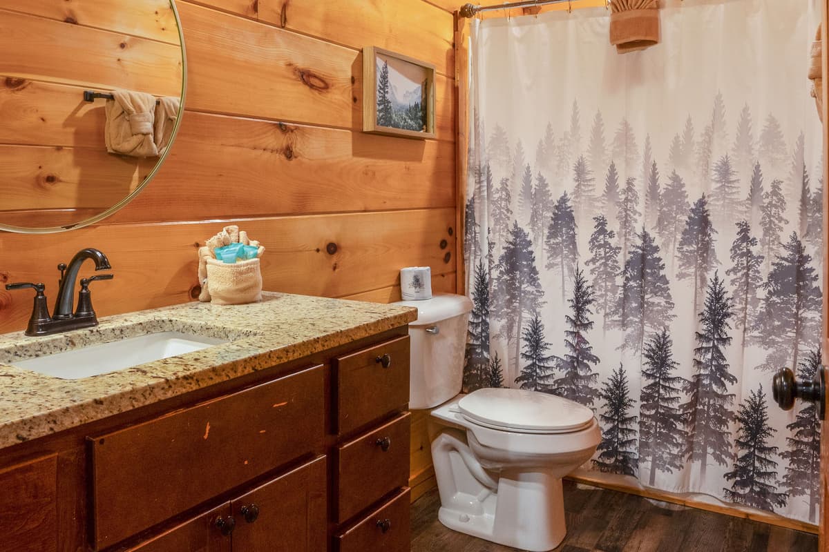 Step into a clean and inviting bathroom designed with comfort and convenience in mind.