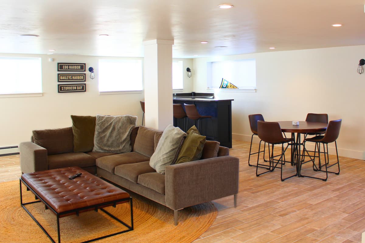 The dedicated TV and game room offers plenty of space for entertainment and family fun.