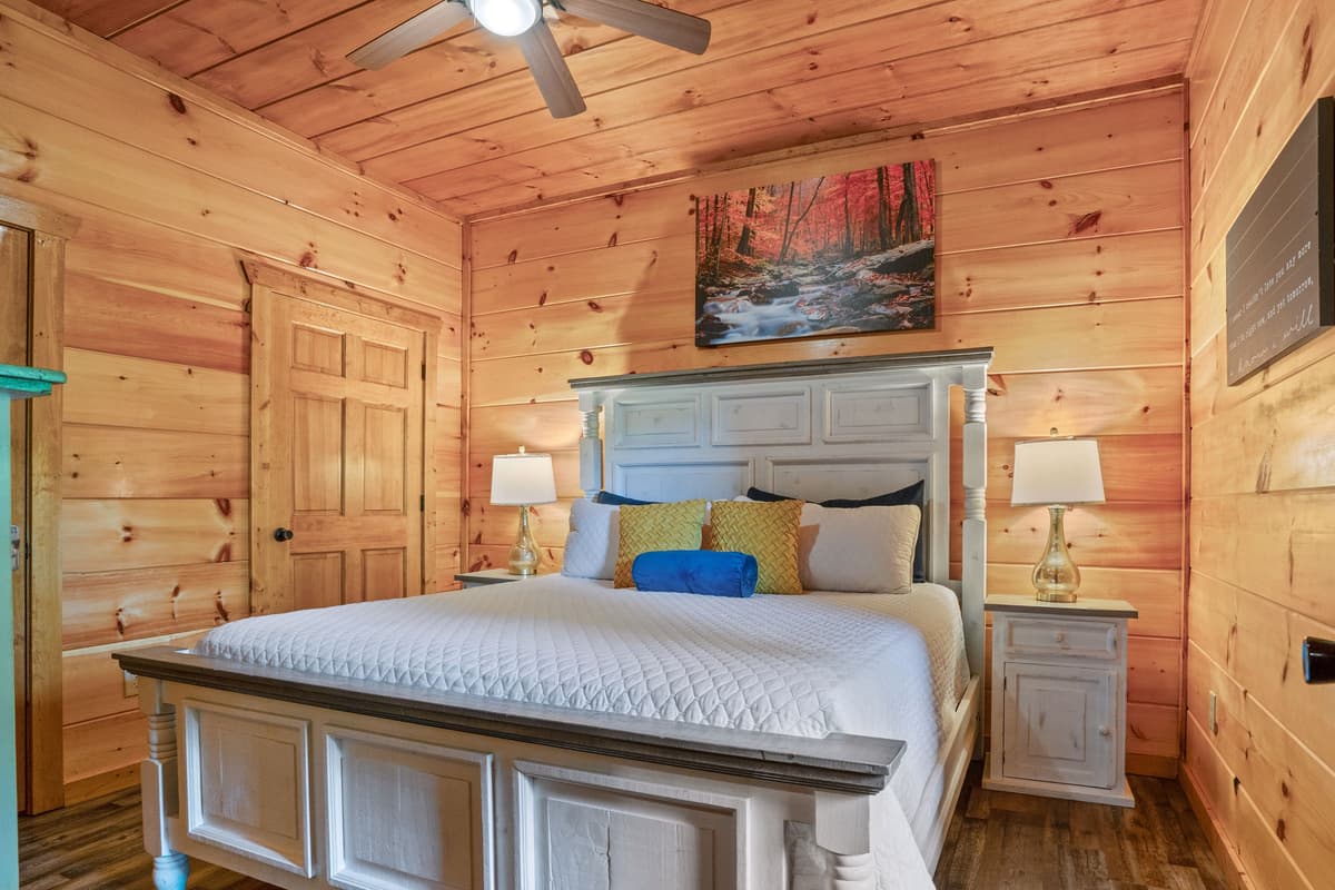 The soft bedding creates a welcoming space to relax and recharge after a day of Smoky Mountain adventures.