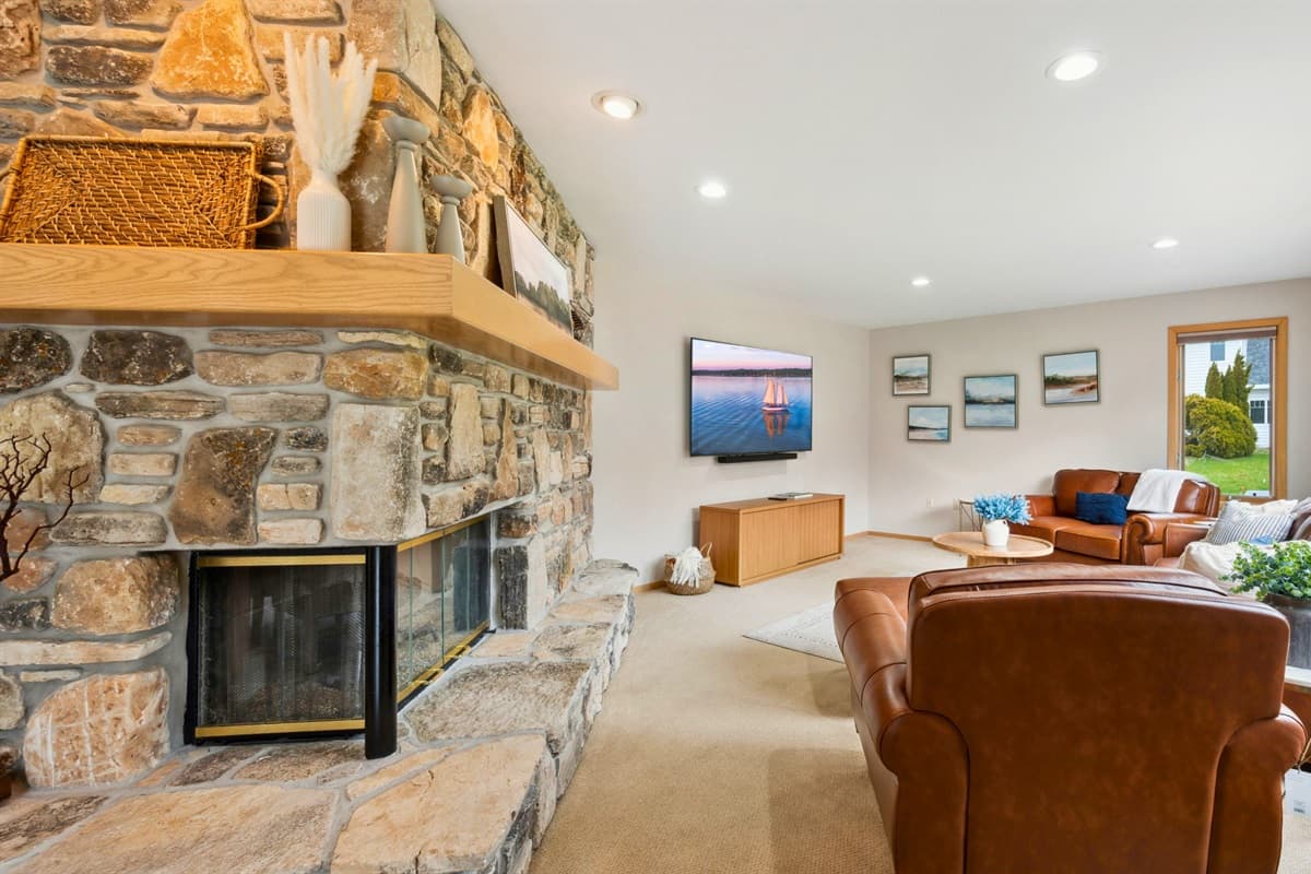 Large windows fill the space with natural light, creating a bright and airy atmosphere.