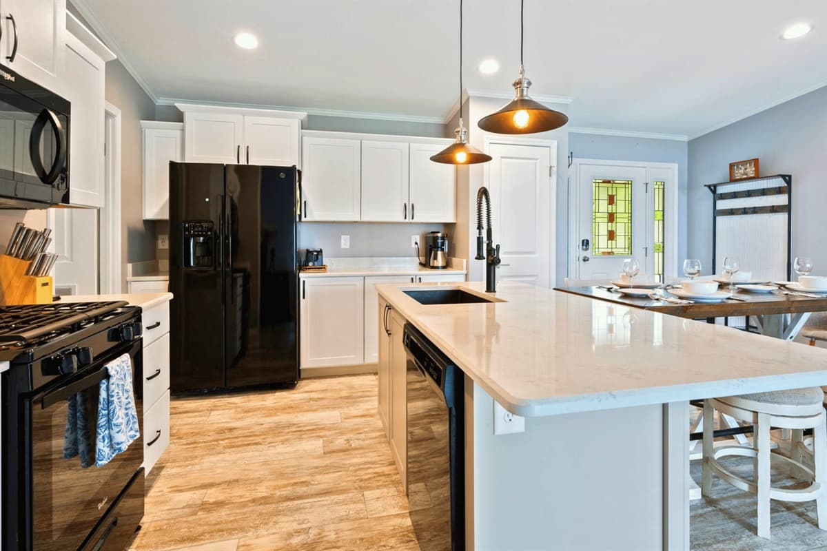 Unleash your inner chef in this stylish kitchen – where cooking dreams come to life, one dish at a time. Welcome to your culinary haven.