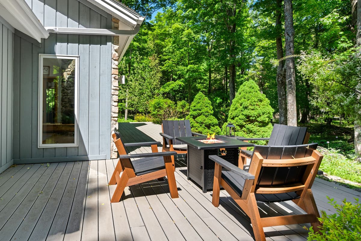 Whether you’re starting the day outdoors or winding down by the fire, this deck is a wonderful place to gather.
