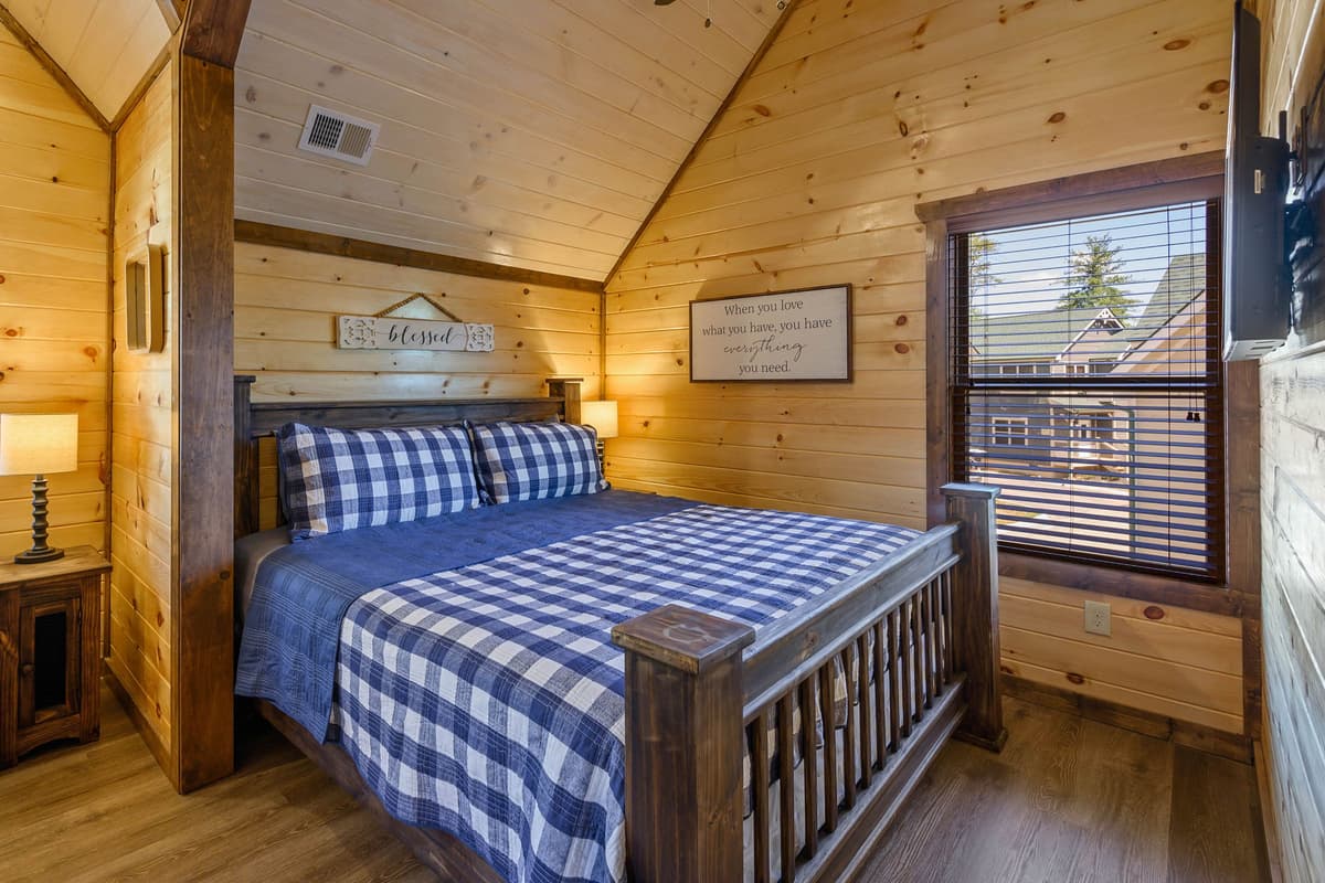 The inviting atmosphere makes this bedroom feel like your own cozy escape.