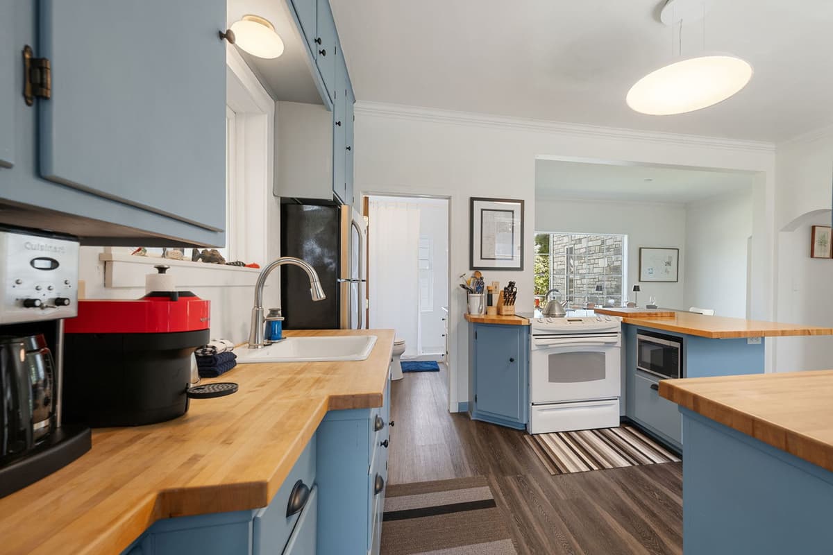 The spacious farmhouse kitchen is designed to make cooking and gathering a breeze.