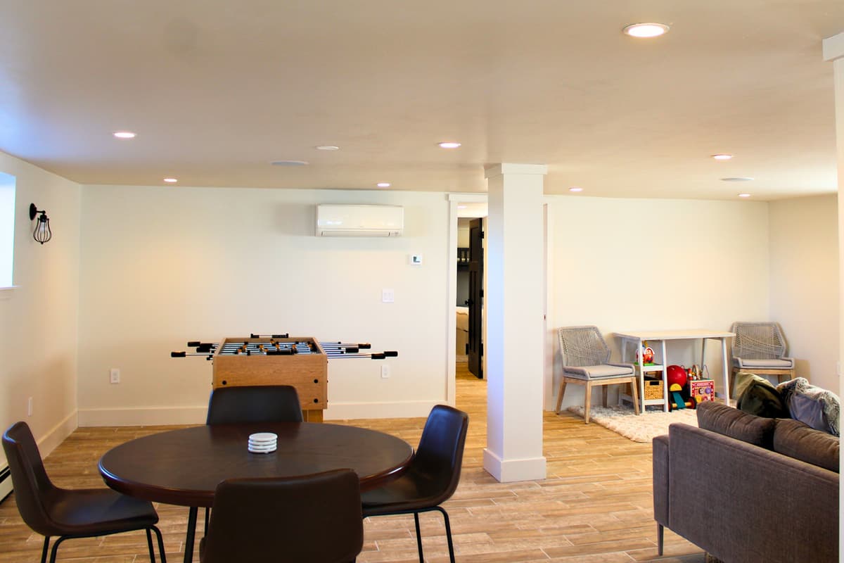 A separate game table provides the perfect spot for board games, cards, puzzles, and other group activities.