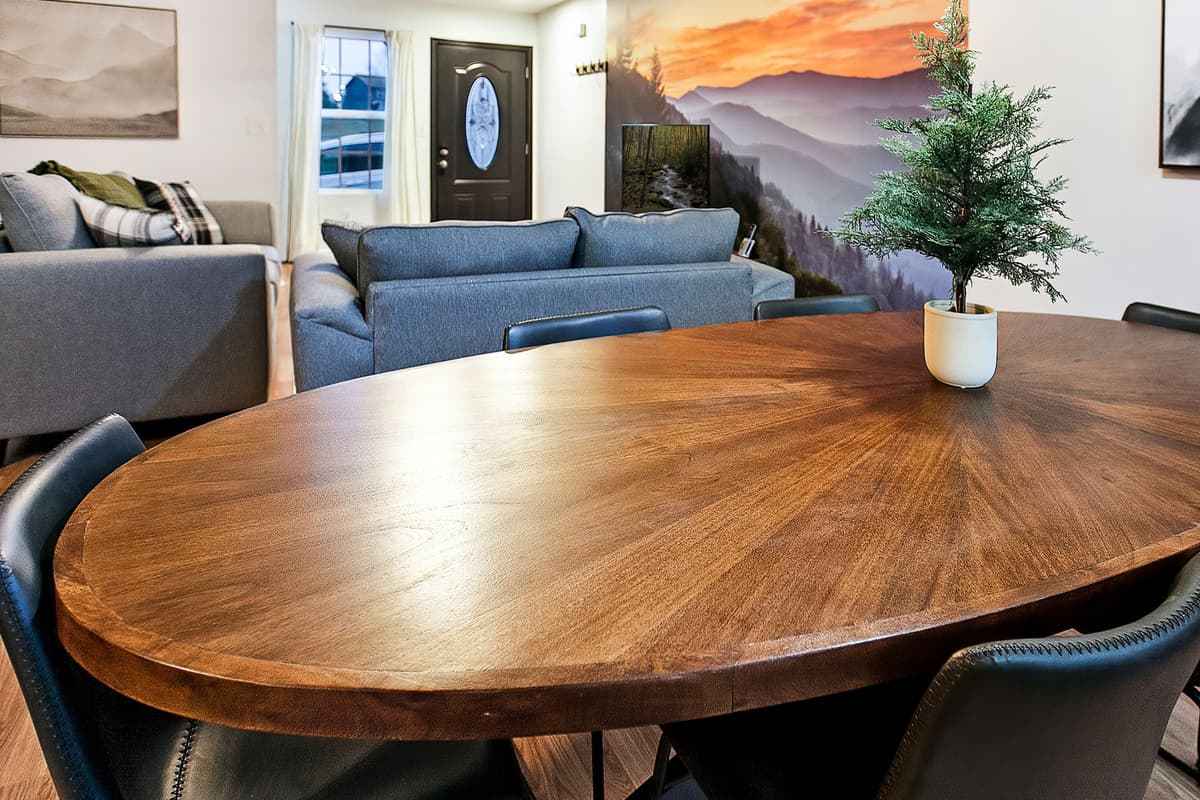 A spacious dining table comfortably seats up to six guests.
