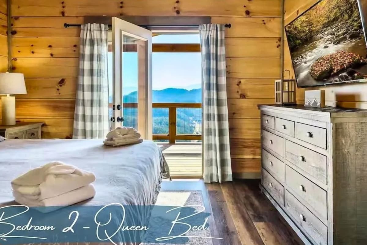 Settle into a spacious bedroom featuring two comfortable queen beds, perfect for families, friends, or groups traveling together.