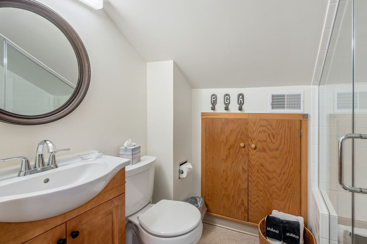 Refresh and recharge in the comfortable full bathroom, thoughtfully designed for convenience during your stay.