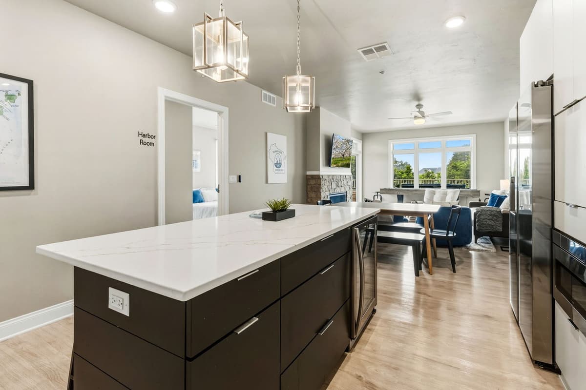 Spacious kitchen featuring stainless steel appliances and plenty of counter space for preparing meals.