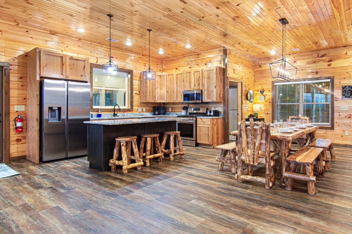 With its open-concept design, this inviting space is perfect for cooking, dining, and making memories during your Smoky Mountain getaway.