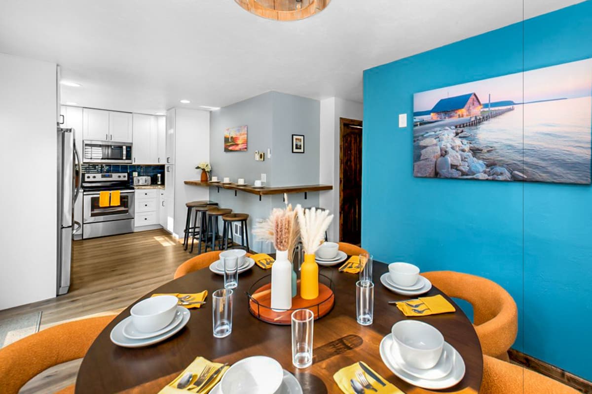 Gather and enjoy time together in the open-concept kitchen and dining area on the main level. The welcoming layout makes it easy to prepare meals, share conversation, and relax together while staying connected to the rest of the living space.