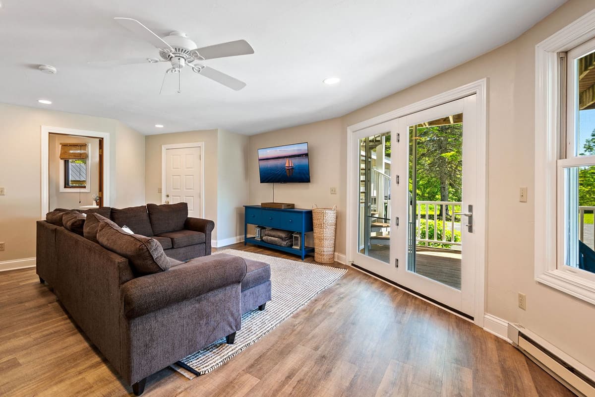 The lower-level living area offers a cozy space to kick back and relax.
