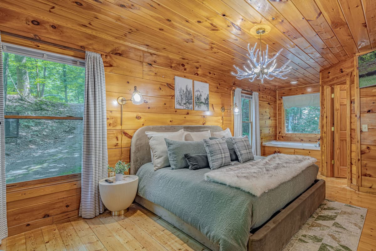 Step into a cozy king bedroom designed to make your stay feel comfortable from the moment you arrive.