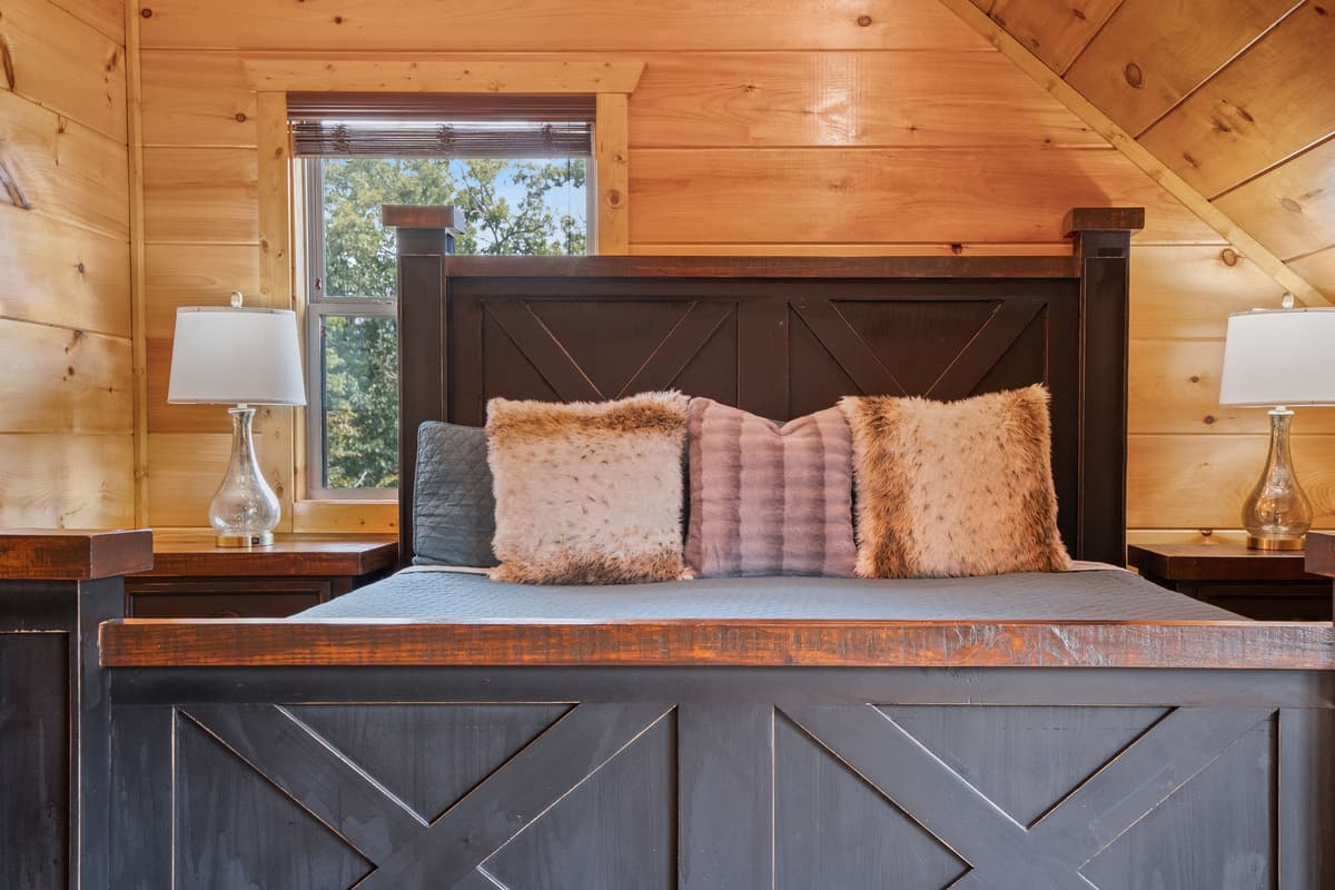 The spacious king-size bed provides plenty of room to stretch out and recharge after a day of Smoky Mountain adventures.