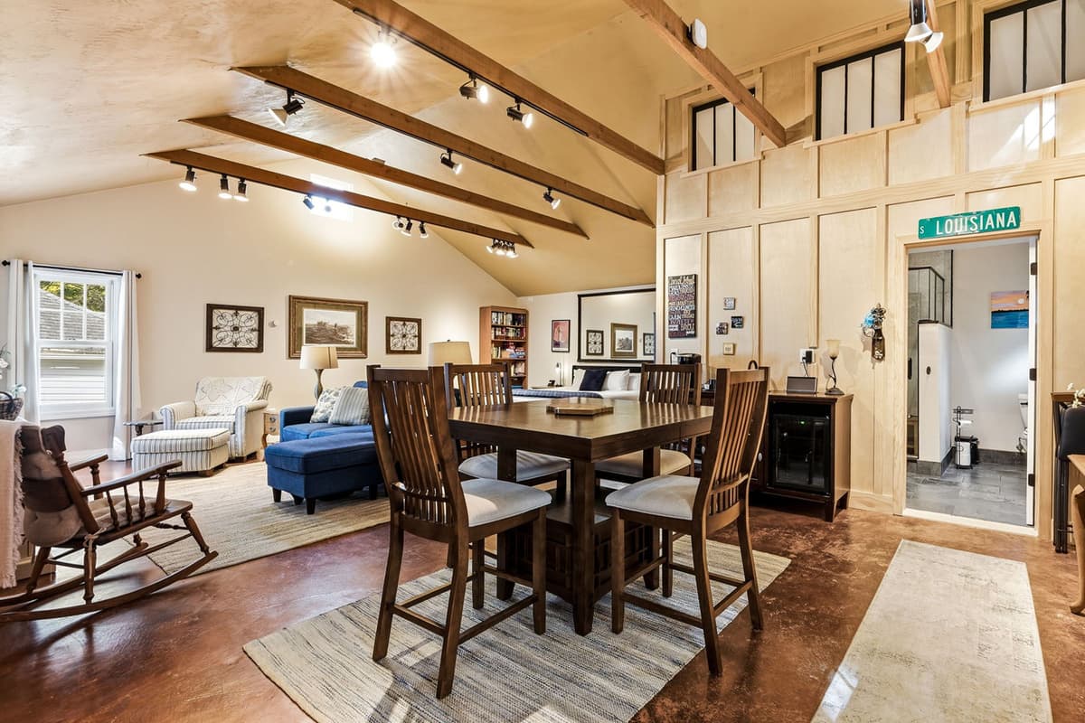 Enjoy the added comfort and privacy of the private suite, featuring its own cozy living space, TV, and dining area.