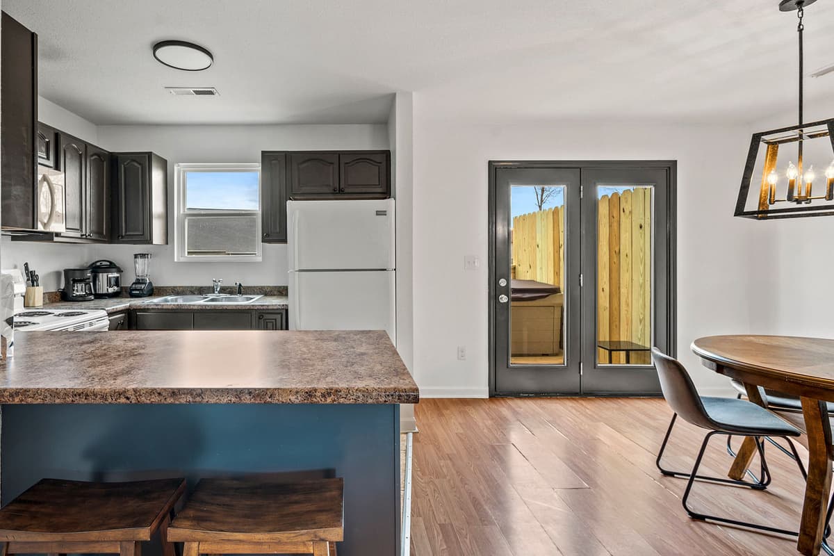 Enjoy the convenience of having the dining area right next to the fully equipped kitchen.