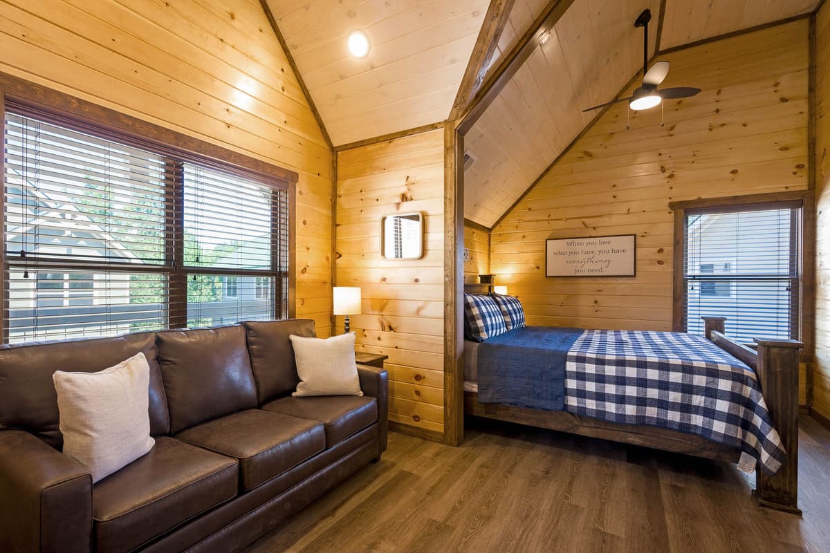 Escape upstairs to the inviting king bedroom, where comfort and relaxation await.