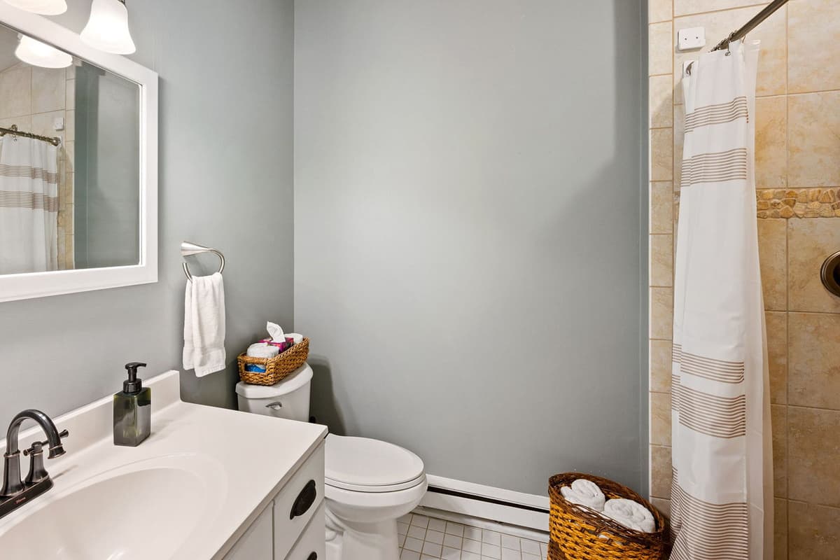 Enjoy the convenience of a full bathroom on the lower level. The bathroom features a spacious walk-in shower for an easy and comfortable experience.