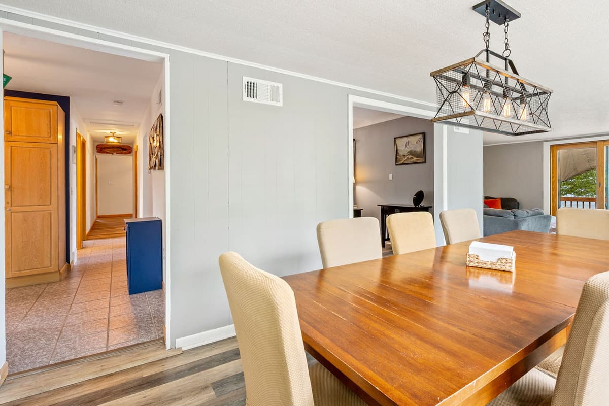 The dining area is conveniently located near the kitchen for easy serving and cleanup.