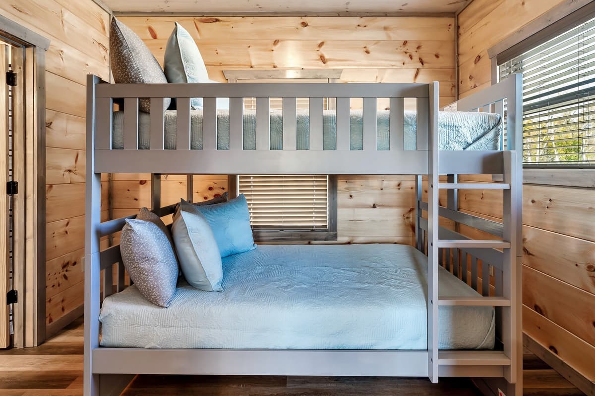 This bunk bedroom features full-over-full bunk beds, giving families and groups plenty of sleeping space to relax and recharge.