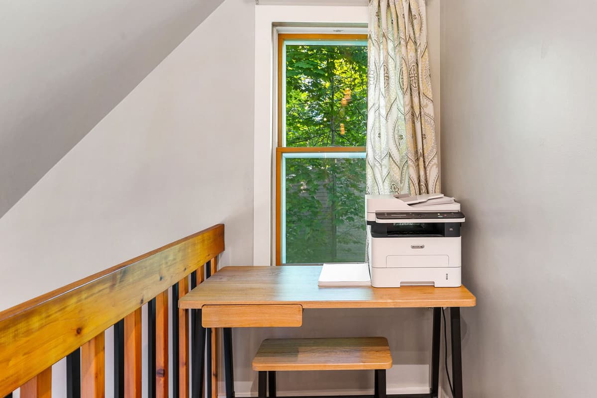 Work and travel can go hand in hand with a dedicated work desk and printer right in the home.