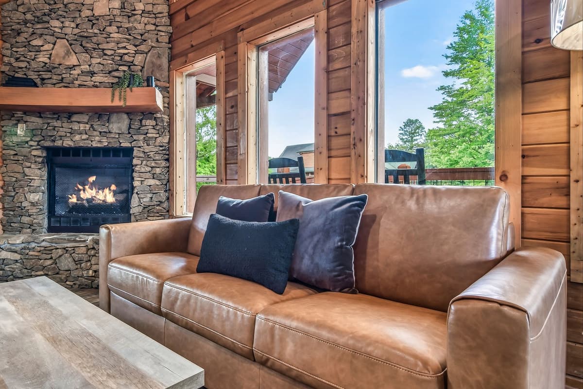 Large windows fill the space with natural light and bring the beautiful surroundings indoors.