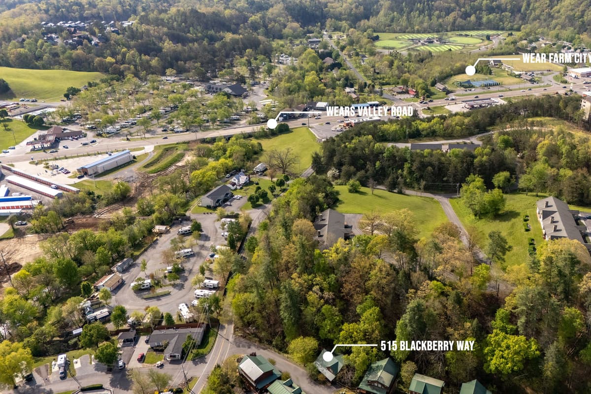 An overhead perspective showcases the beautiful natural setting of our cabin, illustrating its tranquil environment and proximity to the surrounding area.