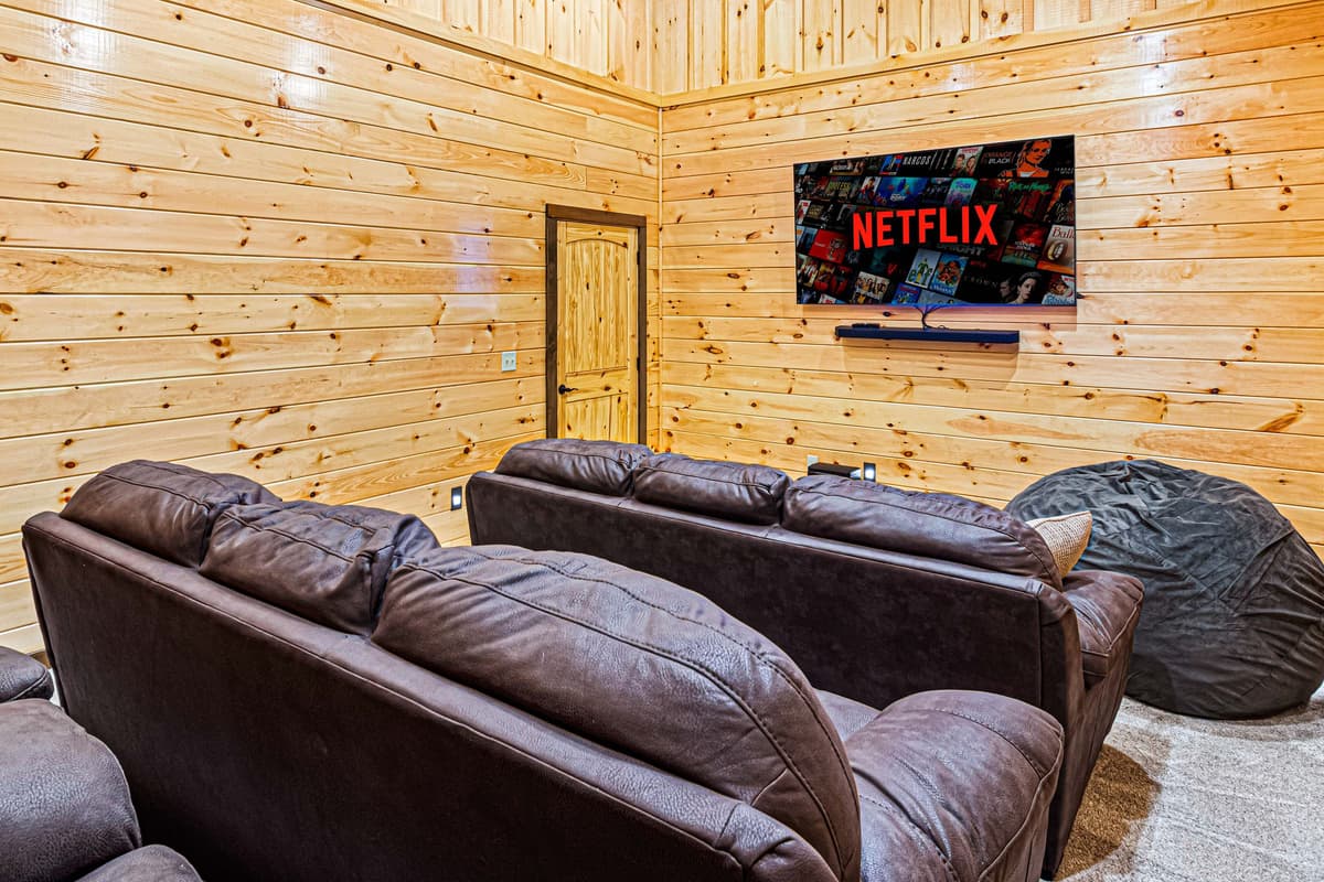 Enjoy the ultimate cabin movie night in the private theater room. Kick back, get comfortable, and watch your favorite movies or shows together in a dedicated entertainment space.