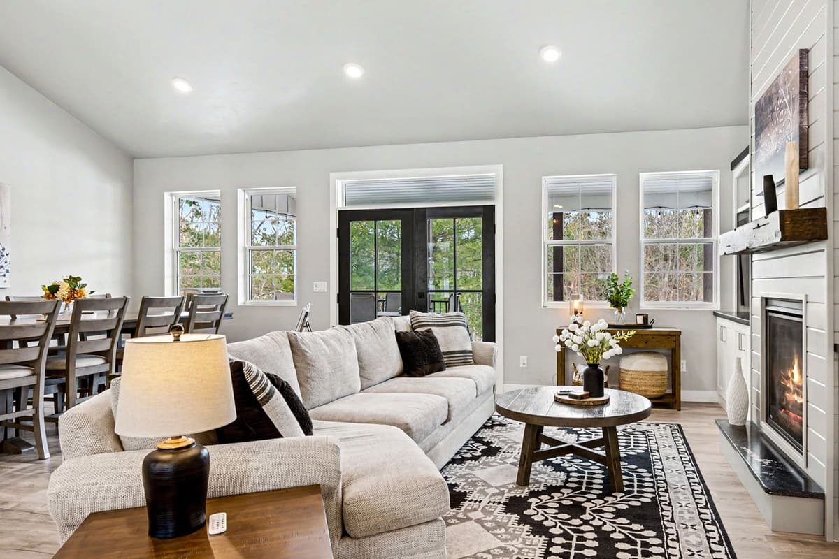 Relax and unwind in the inviting open-concept living room, designed with comfort and gathering in mind.