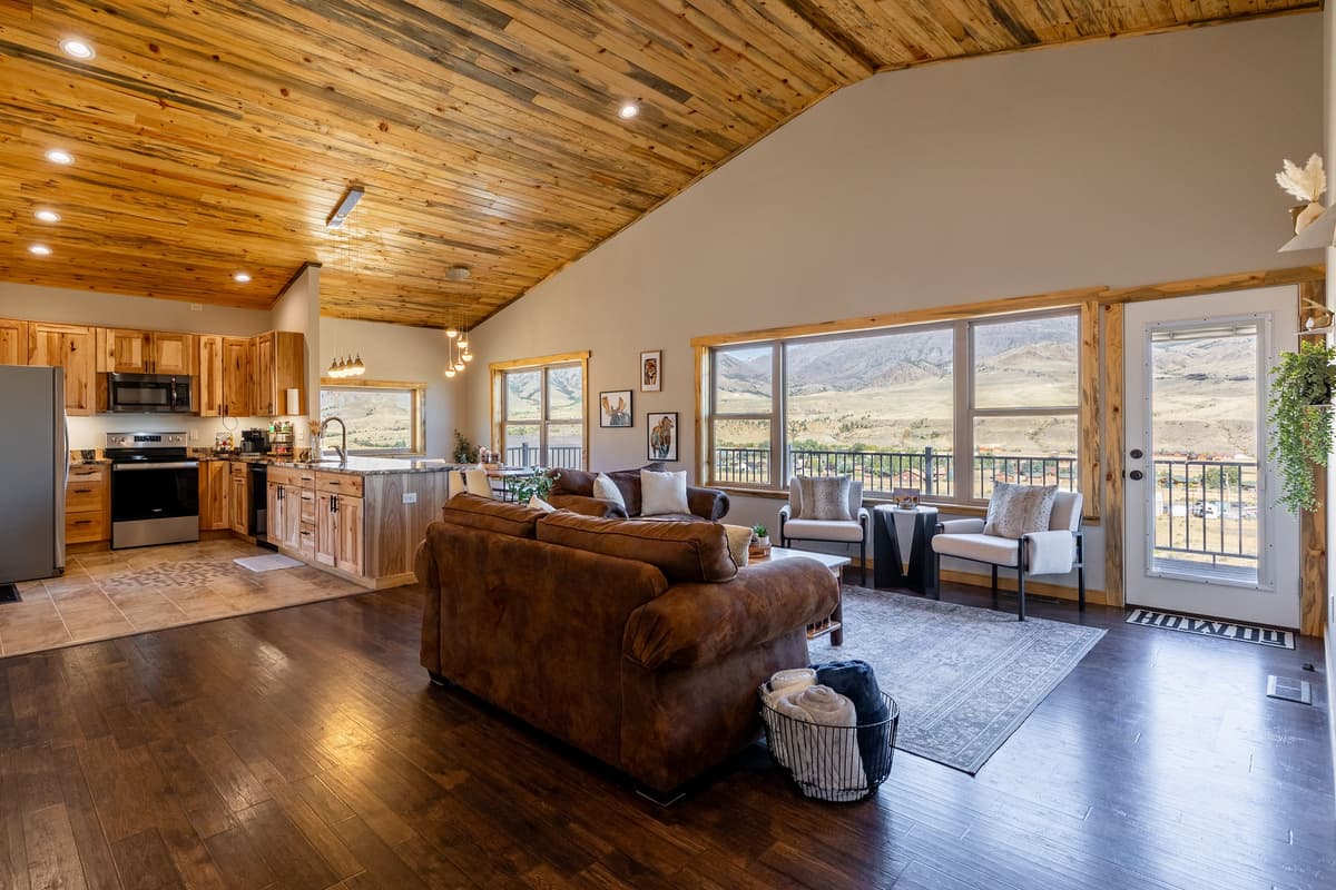 Enjoy plenty of room to relax and gather in this spacious open-concept cabin.  The thoughtfully designed layout connects the living, dining, and kitchen areas for easy conversation and quality time together