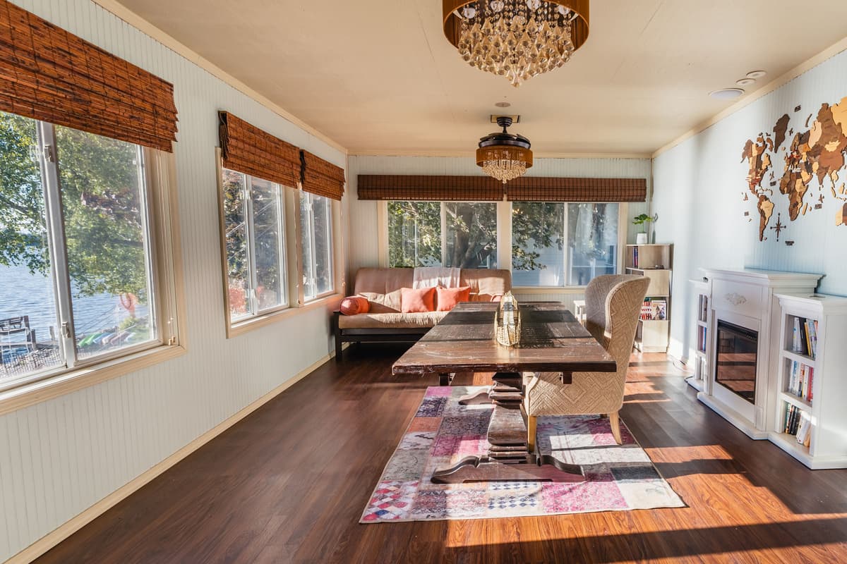 The bright and inviting sunroom offers a peaceful space to enjoy throughout your stay.