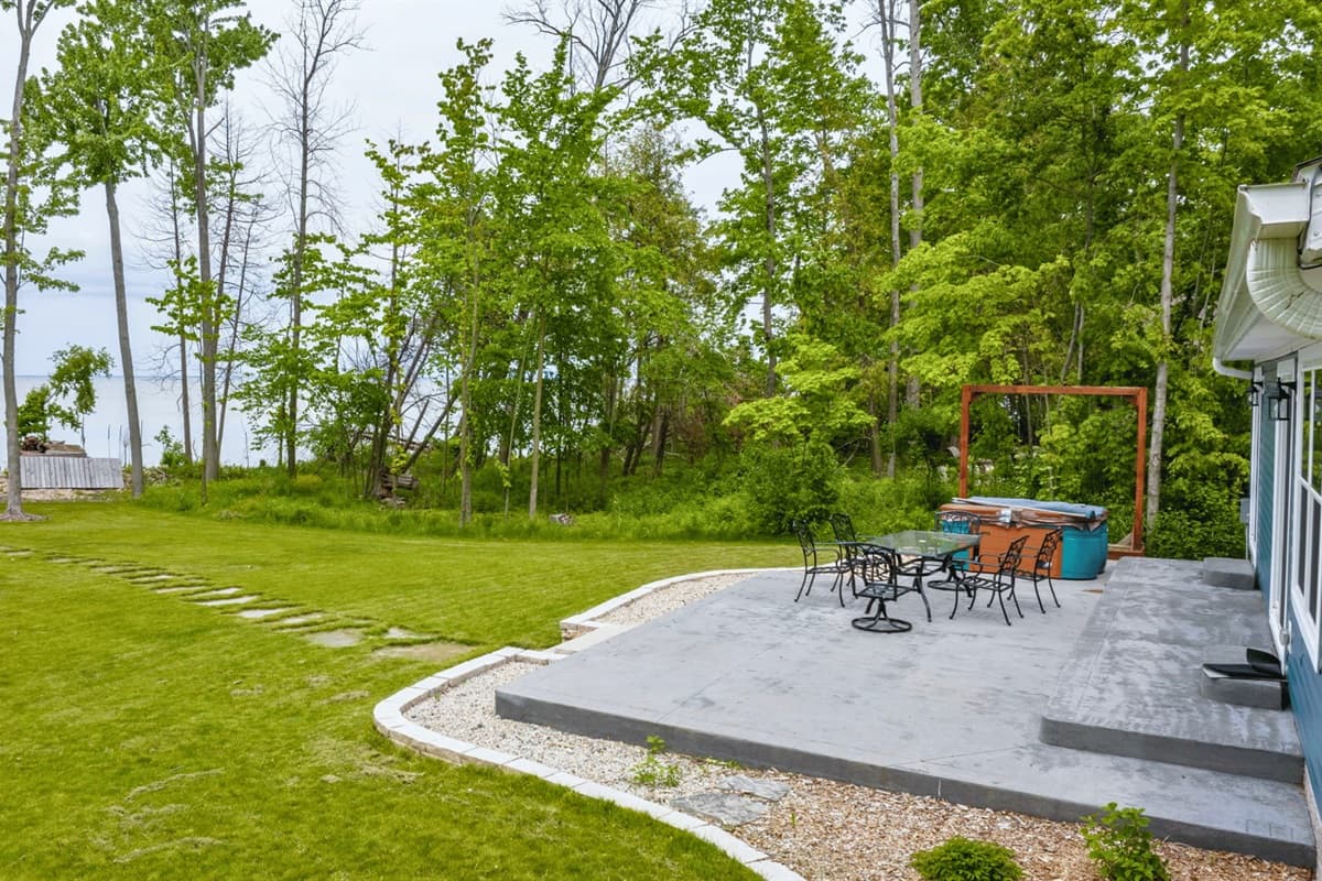 Unwind in style on your spacious porch, where each breath of fresh air carries the scent of tranquility.