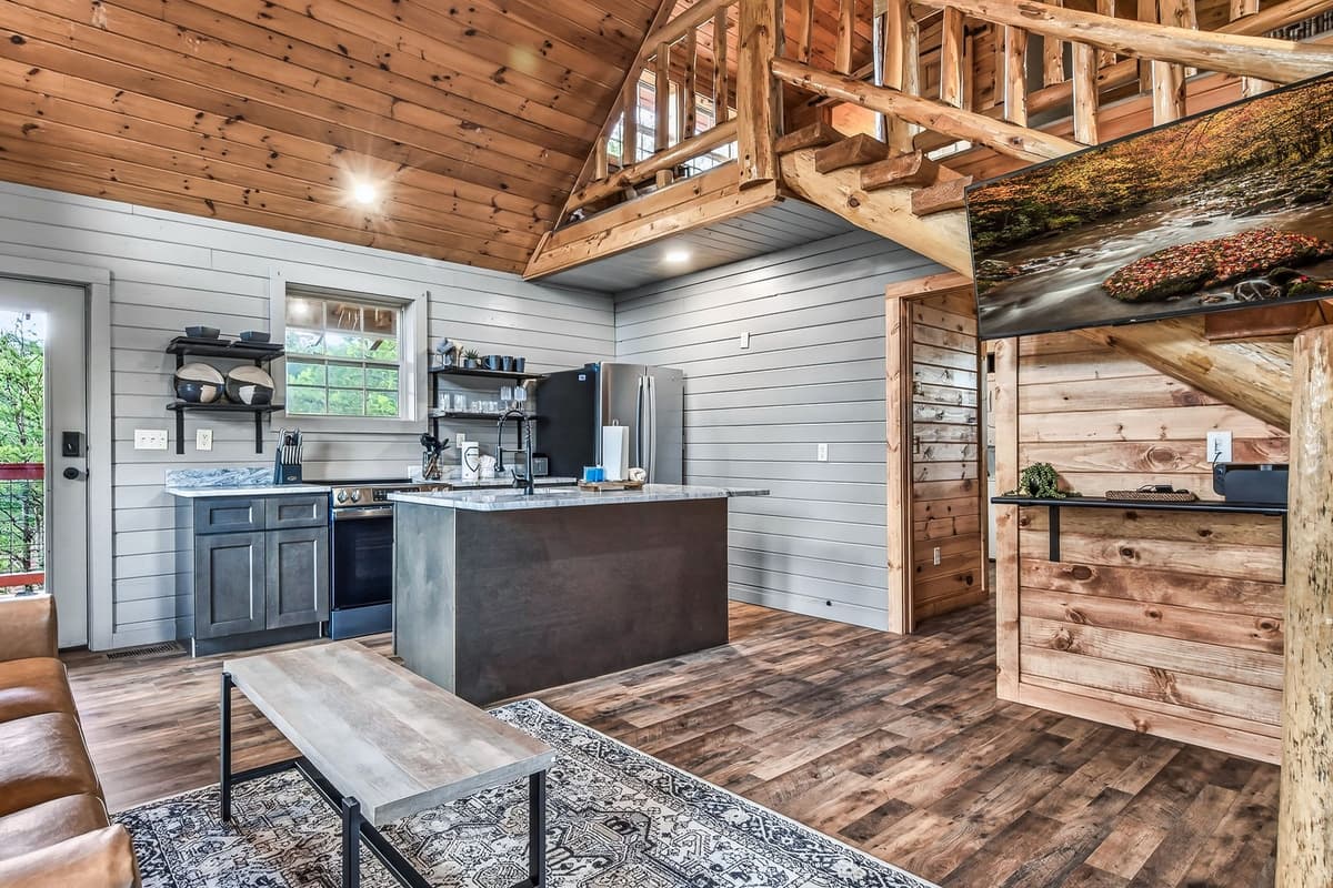 The island comfortably seats four, making it a convenient dining spot for breakfast, lunch, or dinner.