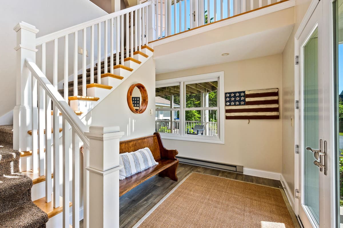 Head upstairs to discover the home’s inviting main living space.