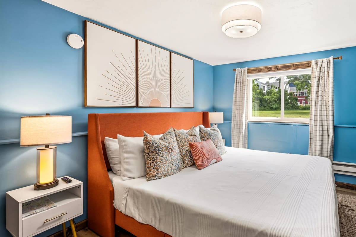 The Blue Room offers a comfortable king-size bed and a relaxing space to unwind after a day of exploring Door County.
