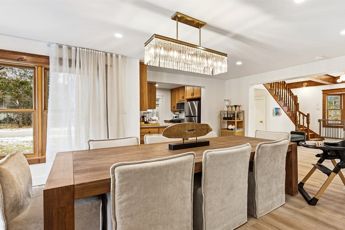 Whether you're enjoying a home-cooked meal or a bottle of wine, this space is designed for both elegance and comfort.